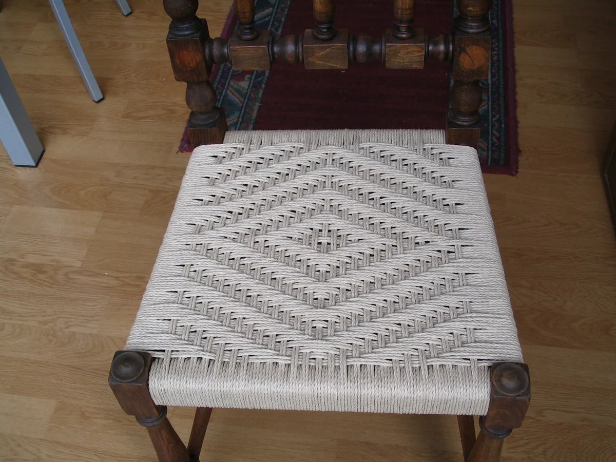 03 — FROM BARE FRAME TO FINISHED SEAT — photograph